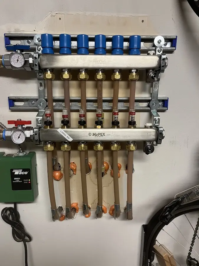 Plumber performing Gas Line Installation at a residential property in Peters